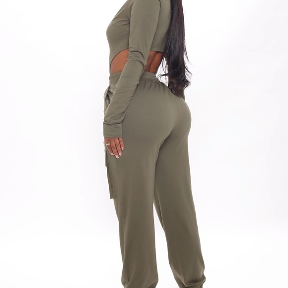 Olive Jogger Pant Set
Zip Front Bodysuit
Long Sleeve
Thong Bottom
Stretch - Picture 2 of 4